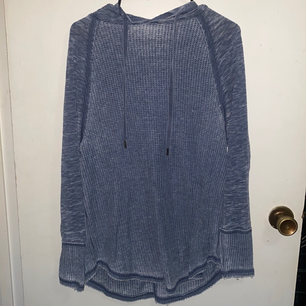 Woman’s blue long sleeve hoodie